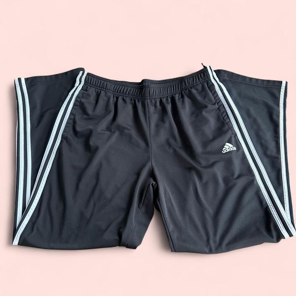 Black Adidas track pants